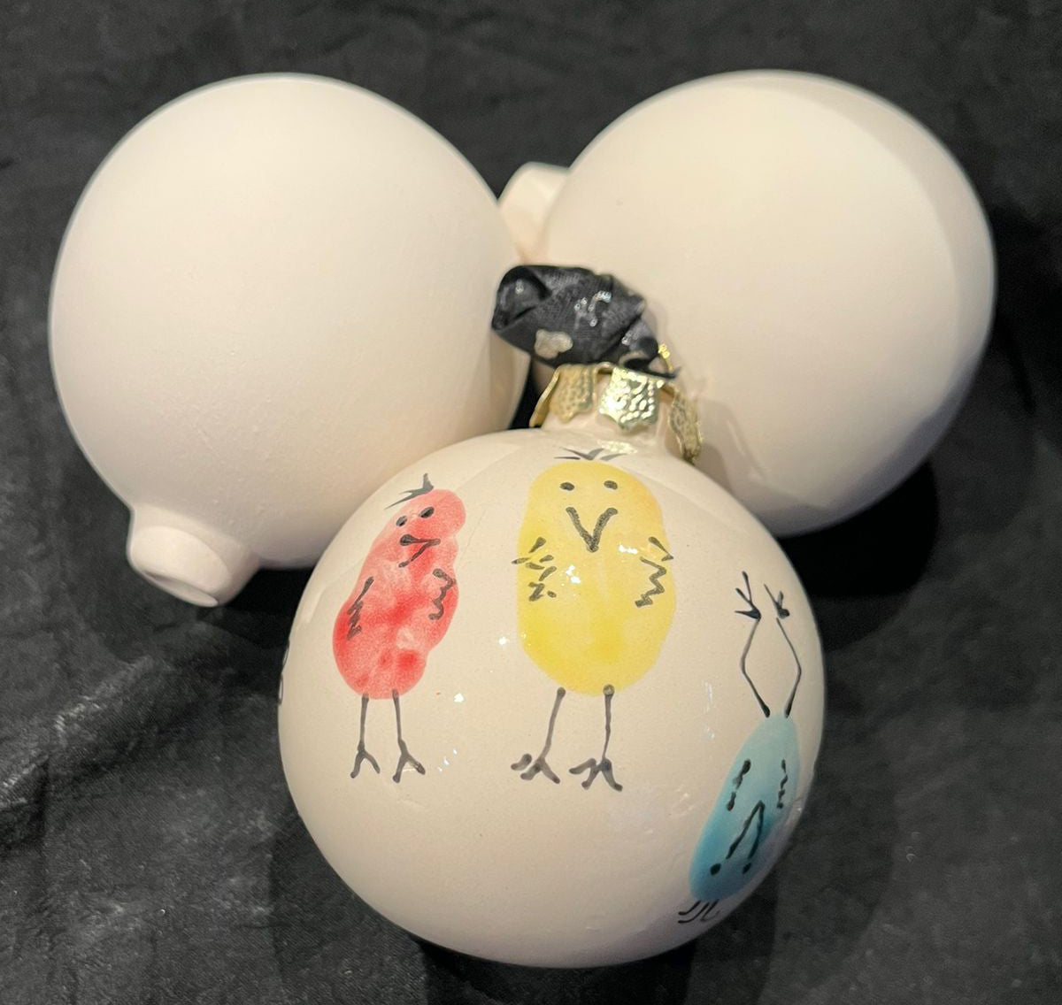 Paint a ceramic bauble or make Paw print baubles Sat 5th Dec 10-3pm